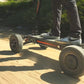 MOVE Electric Scooters - Cycle Board X-Quad 3000 4-Wheel Electric Vehicle  lifestyle a person riding the e-scooter in the rough road