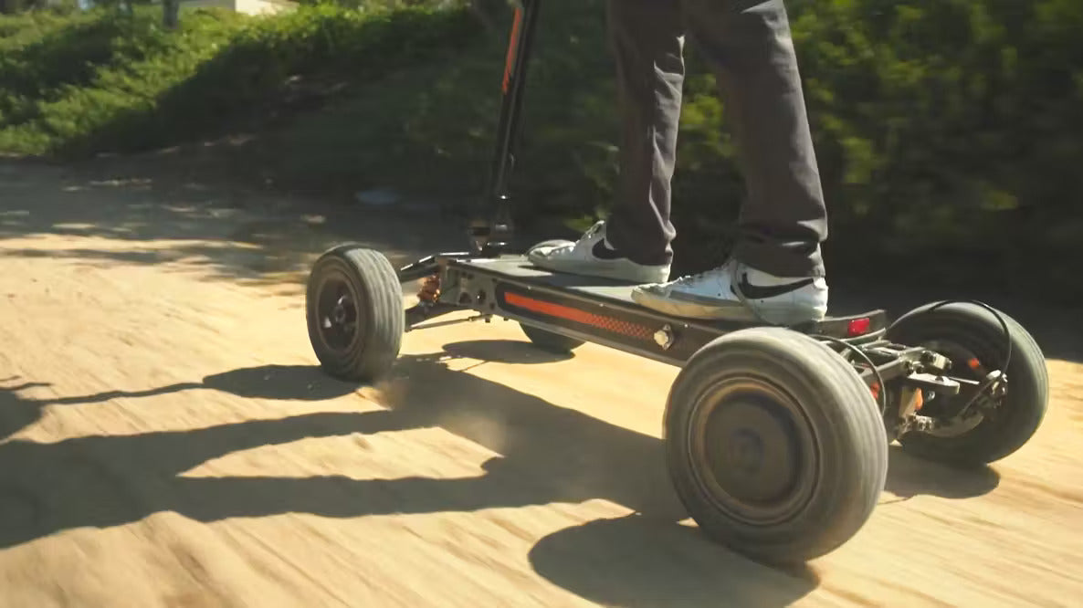 MOVE Electric Scooters - Cycle Board X-Quad 3000 4-Wheel Electric Vehicle  lifestyle a person riding the e-scooter in the rough road