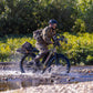 MOVE Electric Scooters - Young Electric E-Explorer Electric Hunting Bike lifestyle man rding his e-bike in a shallow river